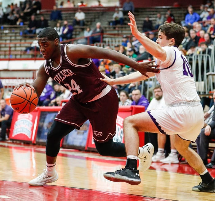 Deontae Craig (24) drives for a layup against Bloomington South's Connor Hickman (10) in a game last December. (Grace Hollars/Indianapolis Star for USA Today Sports)